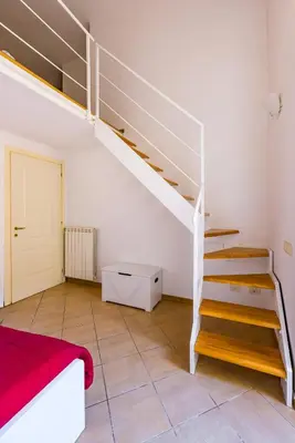 Letto o letti in una camera di Materdei Beautiful Terrace by NapoliApartments