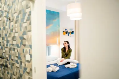 Letto o letti in una camera di Four Points Suites