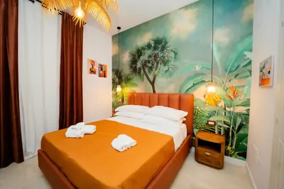 Letto o letti in una camera di Four Points Suites