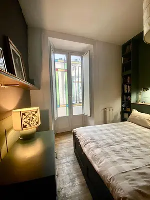 Letto o letti in una camera di Casa Leopardi