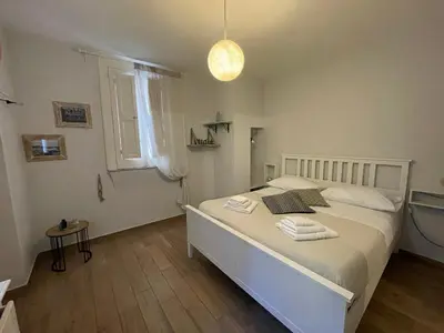 Letto o letti in una camera di Casetta Nolana