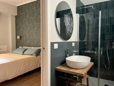 Letto o letti in una camera di Casa Vera