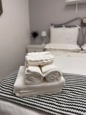 Letto o letti in una camera di La camera di Anna