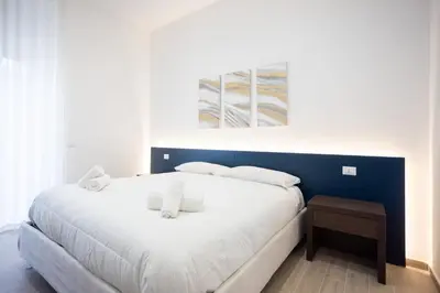 Letto o letti in una camera di Palazzo Pepe