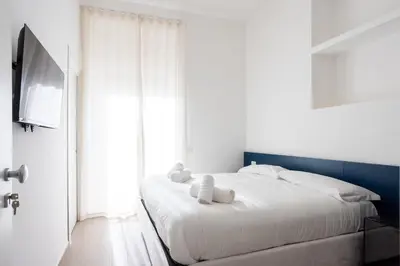 Letto o letti in una camera di Palazzo Pepe