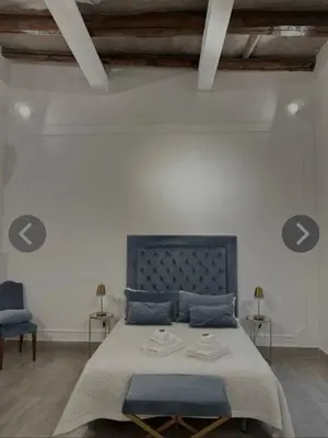 Letto o letti in una camera di Maison Marinella boutique room