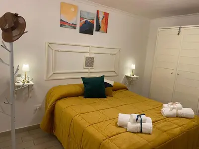 Letto o letti in una camera di I Rifugi Blu e Sole di Neapolis Teatro Antico