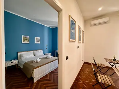 Letto o letti in una camera di Giano's Rooms