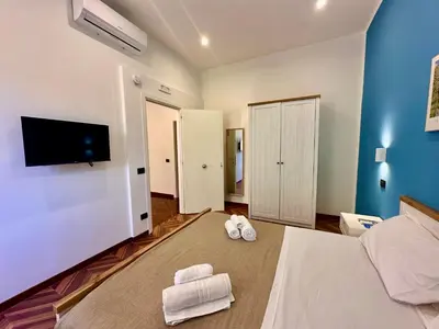Letto o letti in una camera di Giano's Rooms