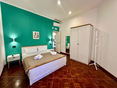 Letto o letti in una camera di Giano's Rooms