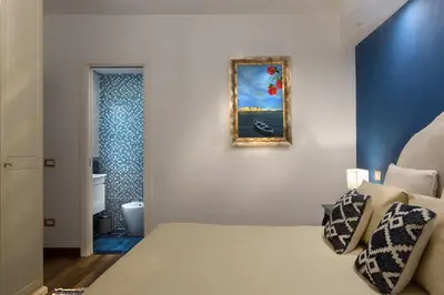Letto o letti in una camera di Luxury flat Sant'Anna place