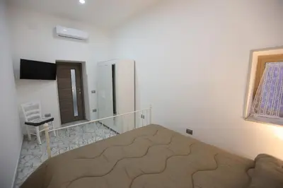 Letto o letti in una camera di Casa Vacanza Da Reginella