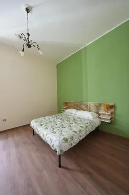 Letto o letti in una camera di Grillo Guest House Naples