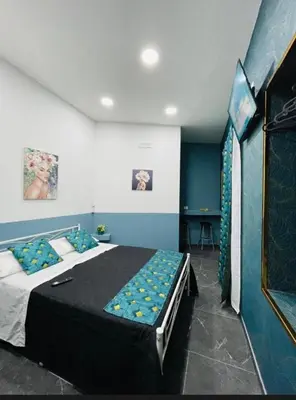 Letto o letti in una camera di Casa corallo