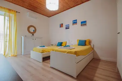 Letto o letti in una camera di Casa Tiestito