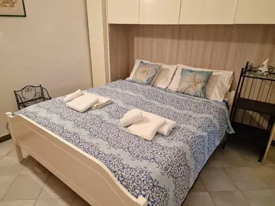 Letto o letti in una camera di Parthenope's House