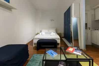 Letto o letti in una camera di Il Vicoletto a Chiaia By Dimorra
