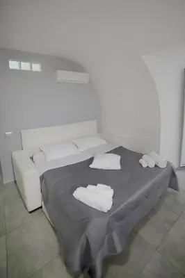 Letto o letti in una camera di Casa Sant Anna