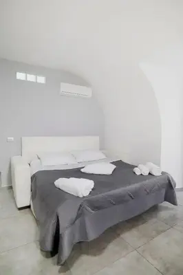 Letto o letti in una camera di Casa Sant Anna