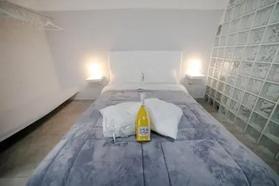 Letto o letti in una camera di Casa Sant Anna