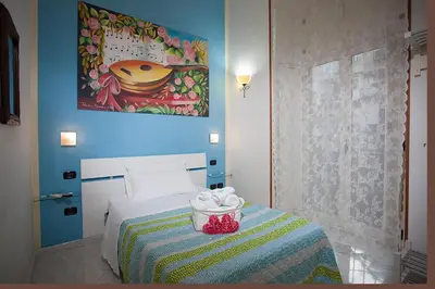 Letto o letti in una camera di Anna's Family