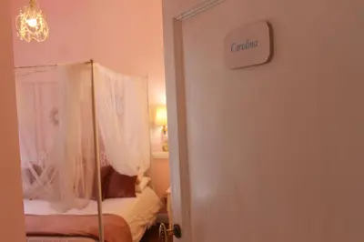 Letto o letti in una camera di B&B Le Sorelle