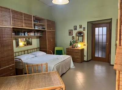 Letto o letti in una camera di Vintage House Bar Naples By FH