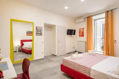 Letto o letti in una camera di Le Voci del Centro By DomusExtra