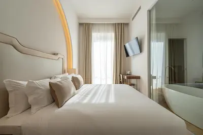Letto o letti in una camera di Puro By Unico Relais