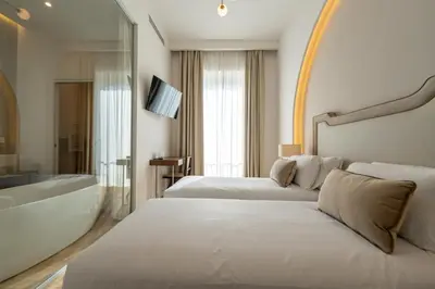 Letto o letti in una camera di Puro By Unico Relais