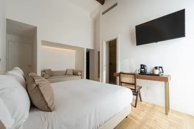 Letto o letti in una camera di Puro By Unico Relais