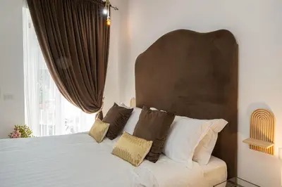 Letto o letti in una camera di Terra Apartment City Center Napoli By Dimorra