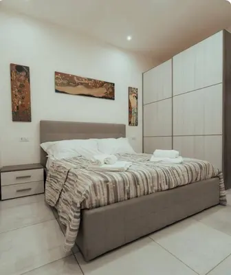 Letto o letti in una camera di Dimora311