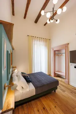 Letto o letti in una camera di The Other Duomo House By House In Naples