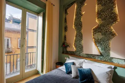 Letto o letti in una camera di The Other Duomo House By House In Naples
