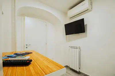 TV o dispositivi per l'intrattenimento presso Ricomincio da 3 Apartment Capri Centro Storico