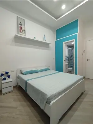 Letto o letti in una camera di Stanza centrale