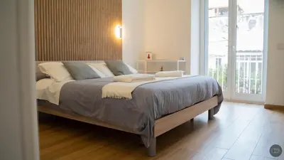 Letto o letti in una camera di CDB Apartments