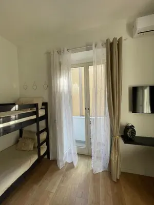 Letto o letti in una camera di La città di Pulcinella