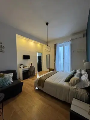 Letto o letti in una camera di La città di Pulcinella