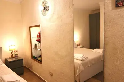 Letto o letti in una camera di B&B Tipico
