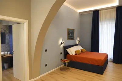 Letto o letti in una camera di Home 109 Luxury Rooms