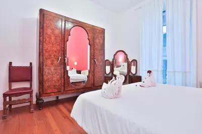 Letto o letti in una camera di GuestHost - Residenza Mura Greche Historic Center