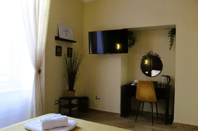 TV o dispositivi per l'intrattenimento presso BlackWoody Contemporary Rooms - Napoli Centro Storico Via Toledo