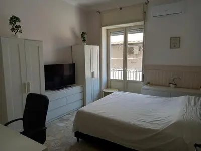 Letto o letti in una camera di Vista Mancini