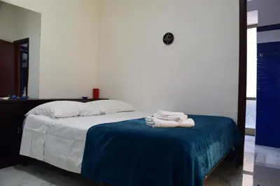 Letto o letti in una camera di Casa Artemisia