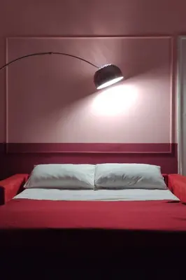 Letto o letti in una camera di Maison Metro Mergellina