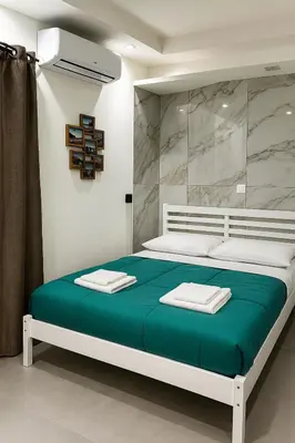 Letto o letti in una camera di House Piazza Plebiscito by Loveinthetravel