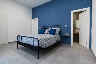 Letto o letti in una camera di Alyde Apartments