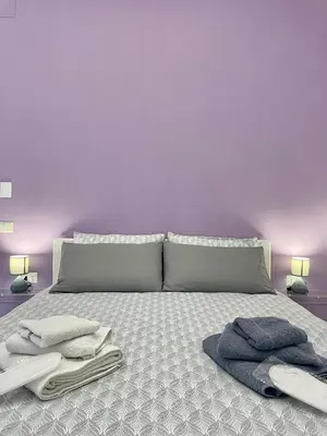 Letto o letti in una camera di B&B Dimora Cortese